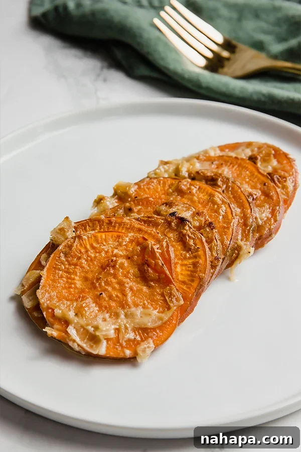 Delicious Whole30 Vegan Sweet Potato Gratin 4 Sweet Potato Gratin close-up, showcasing its creamy layers and golden top