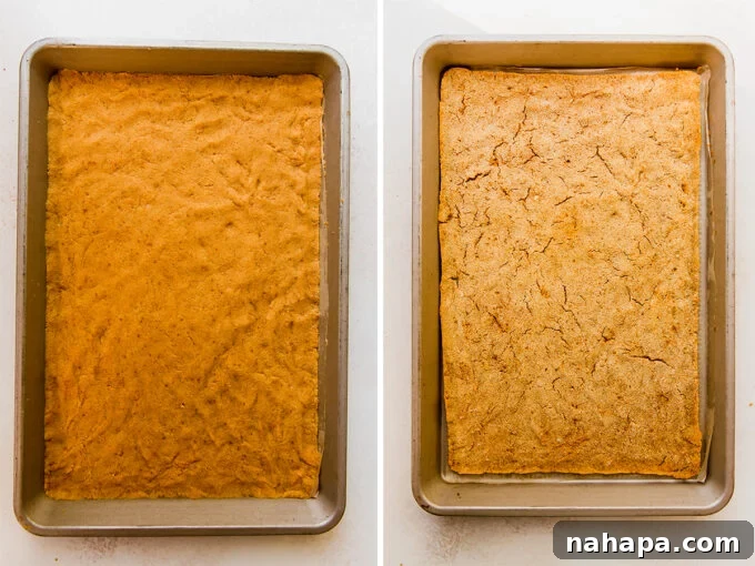 pumpkin roll cake batter spread in pan