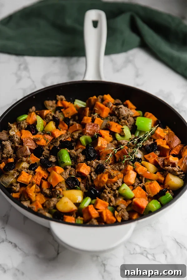 Hearty Grain-Free Sweet Potato Sausage Stuffing 3 Close-up of Paleo Sweet Potato Sausage Stuffing, showing texture and ingredients