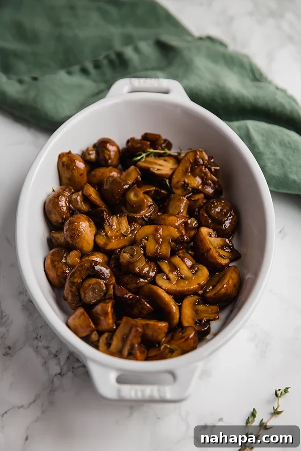 Close-up of Garlic Balsamic Mushrooms with fresh thyme