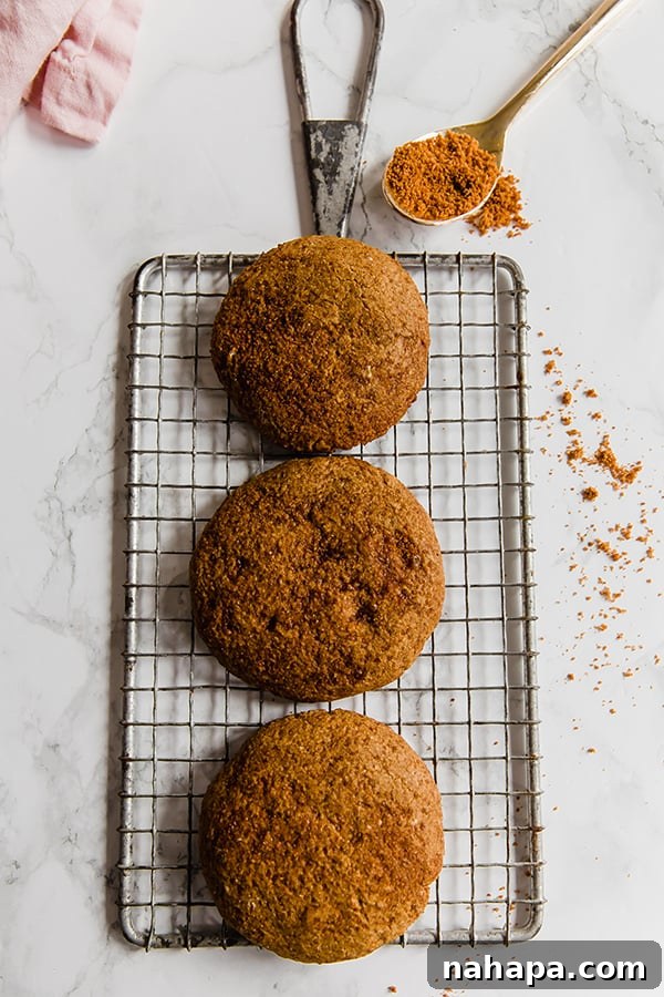 A plate of Paleo Gingersnap Cookies with a festive background, ready to be served.