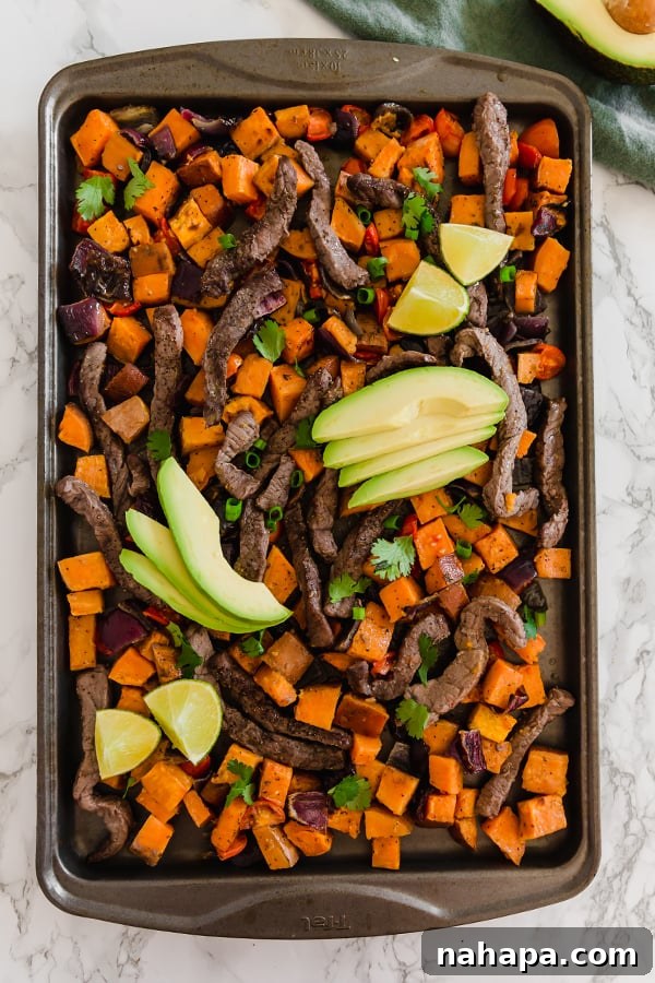 Sheet Pan Breakfast Taco Hash ready to be garnished
