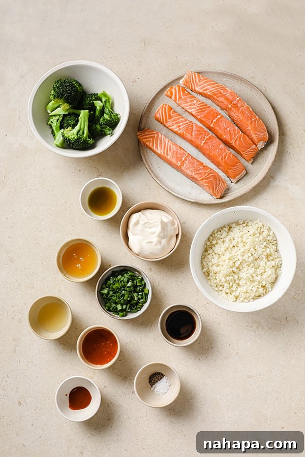 Clean Eating Bang Bang Salmon Bowls 3 Bang Bang salmon ingredients in separate bowls ready for preparation