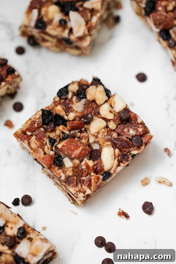 Effortless Weekly Meal Prep Guide 6 Grain-free granola bars displayed on a board.