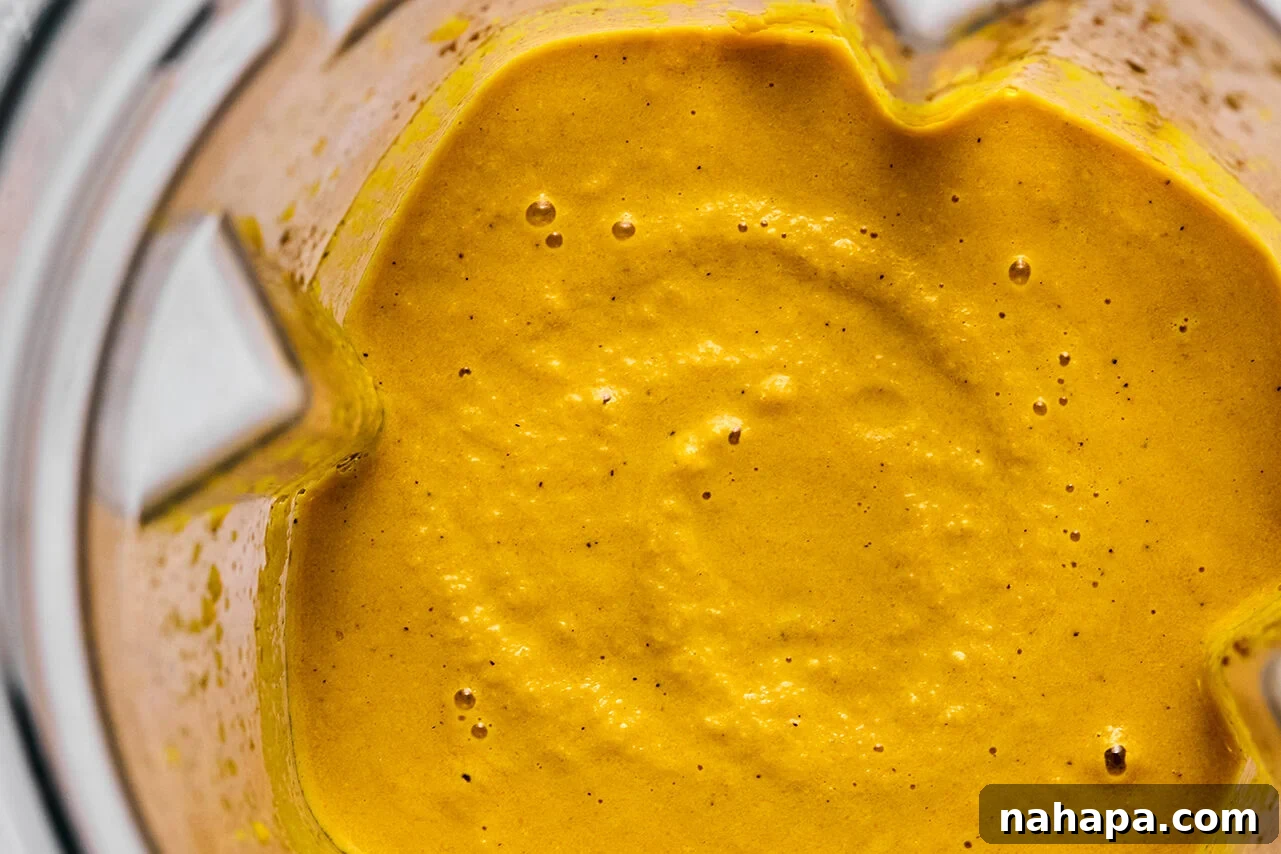 Hibachi Style Ginger Dressing 5 The Japanese ginger dressing blending in a high-speed blender, creating a smooth and creamy texture.