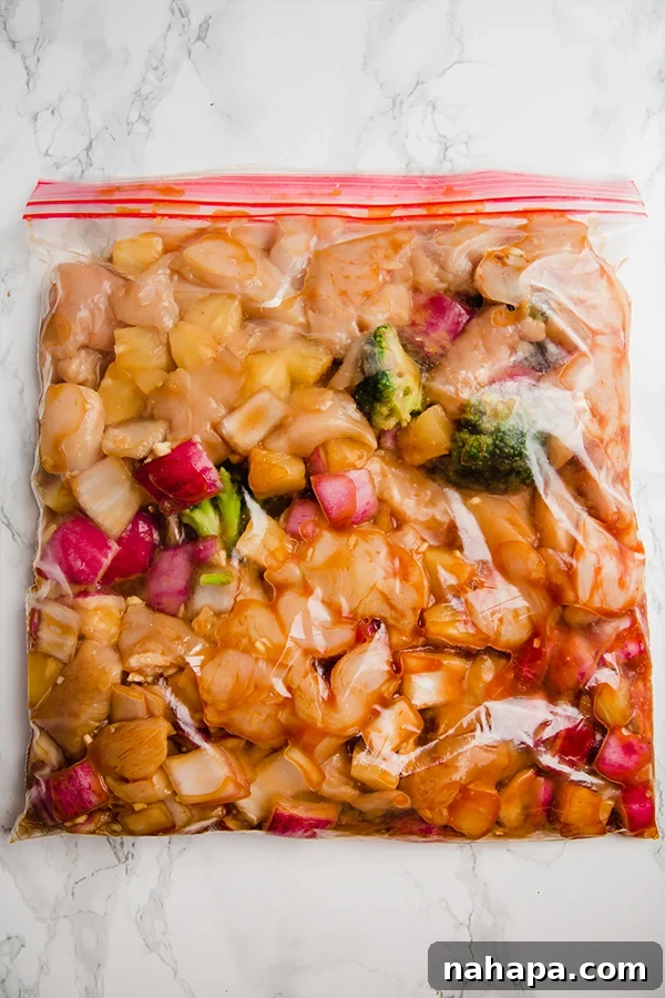 Hawaiian chicken ingredients in a freezer bag, ready for meal prep