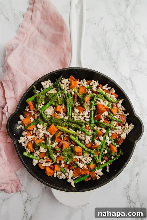 Hearty Turkey, Sweet Potato, and Asparagus Skillet 3 Close-up of asparagus, turkey, and sweet potato skillet