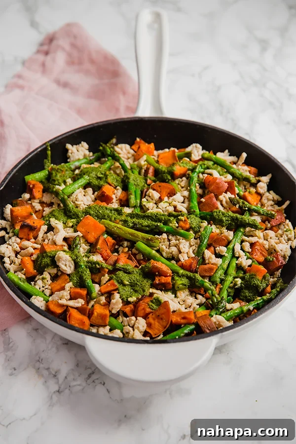 Hearty Turkey, Sweet Potato, and Asparagus Skillet 4 Asparagus, Turkey & Sweet Potato Skillet served in a pan