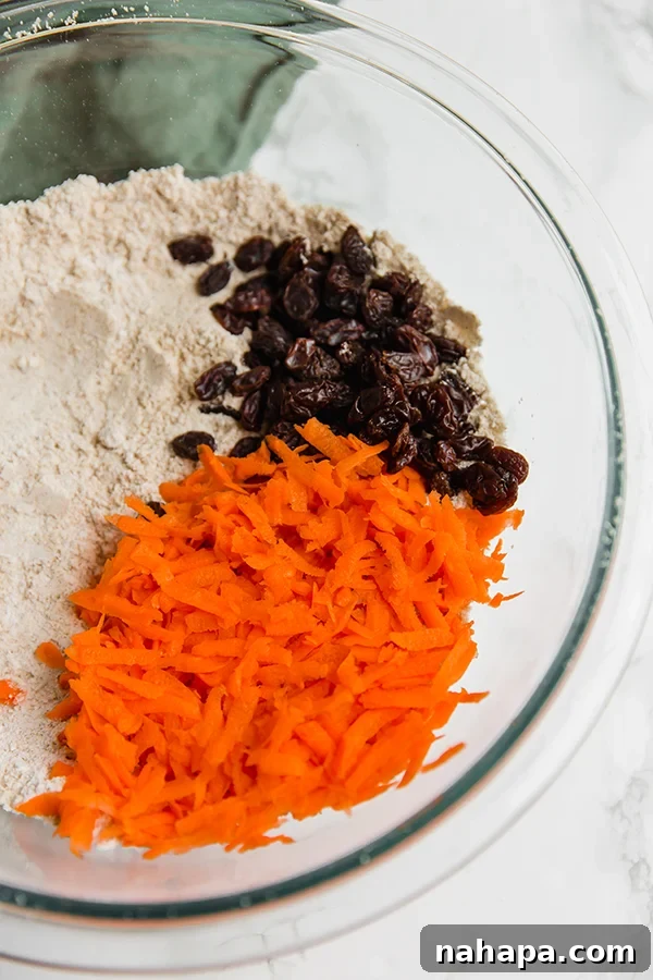 Nourishing Paleo Gluten-Free AIP Carrot Cake Scones 3 Mixing the dough for grain-free, nut-free carrot cake scones