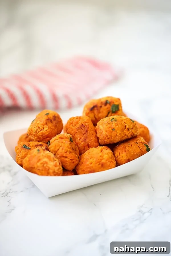 Homemade Sweet Potato Tater Tots served with dipping sauce