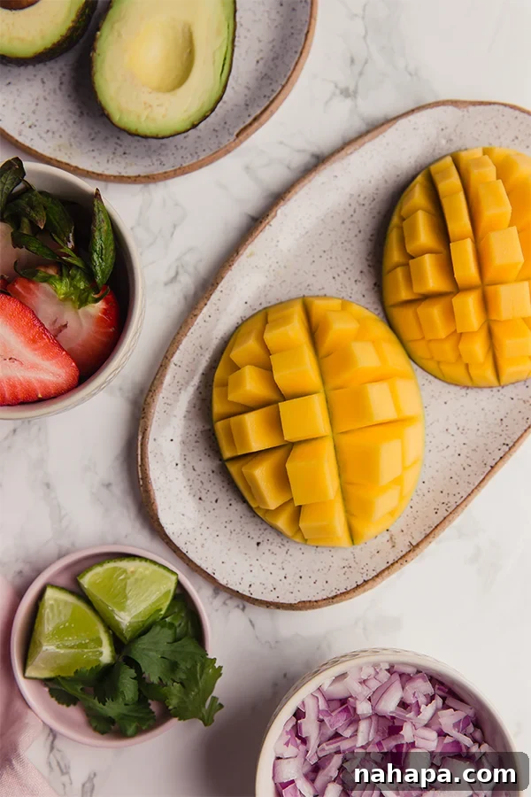 Close-up of fresh mango salsa ingredients diced and ready to mix