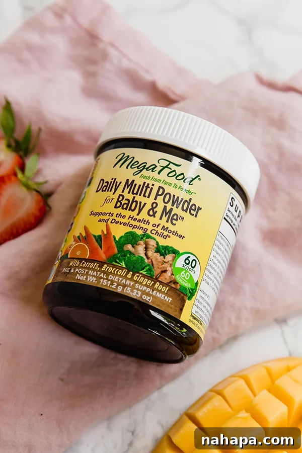 Ingredients for a healthy green mama smoothie on a white surface