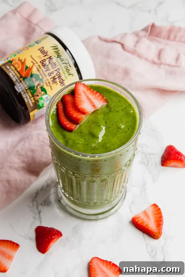 Green Mama Smoothie ready to drink, garnished with a straw