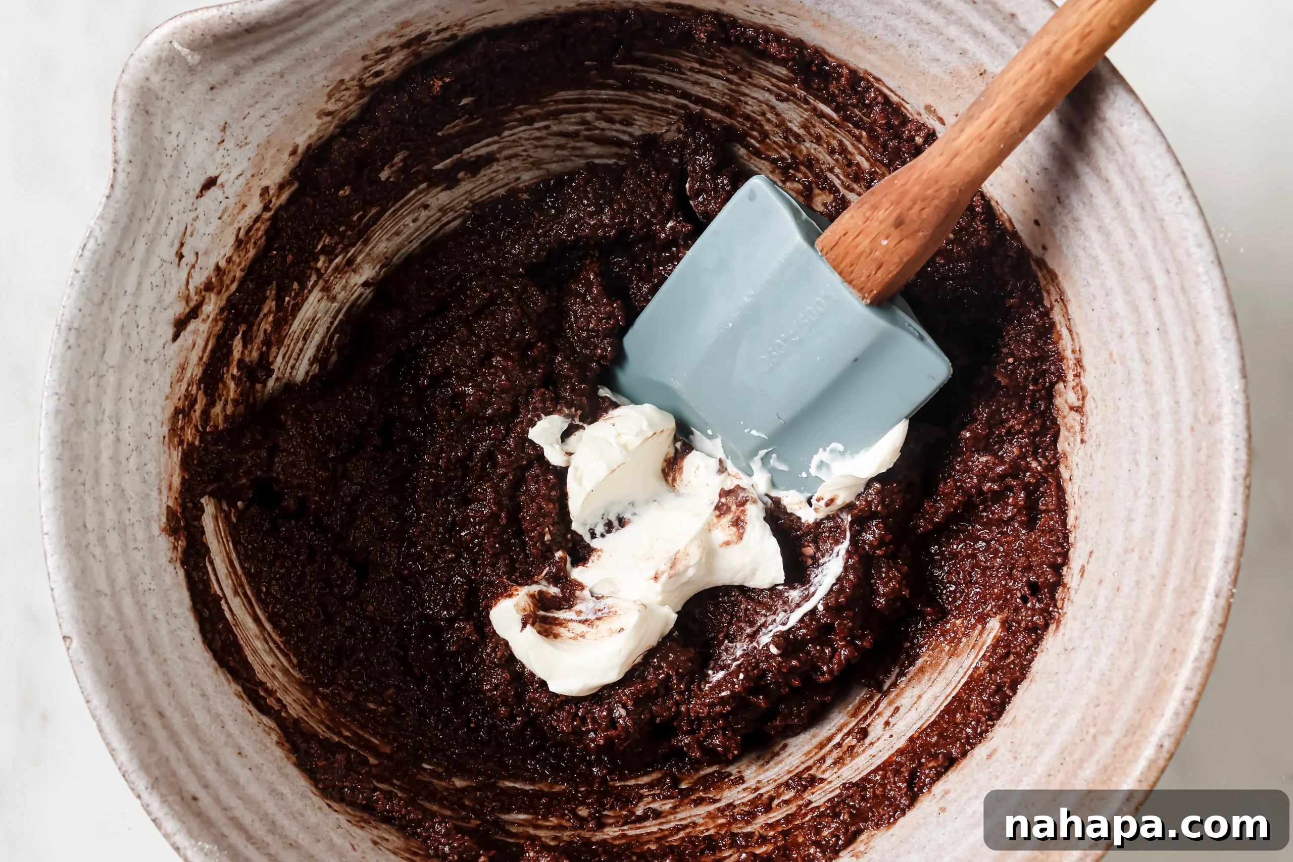 Mixing dry ingredients into wet ingredients