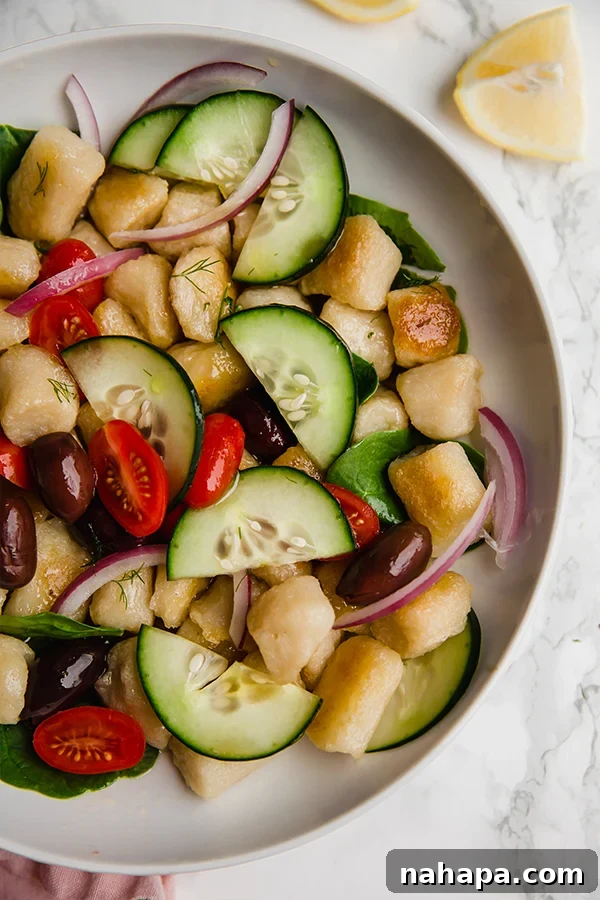 Hellenic Gnocchi Bowl 4 Beautifully plated Greek Gnocchi Salad with fresh herbs