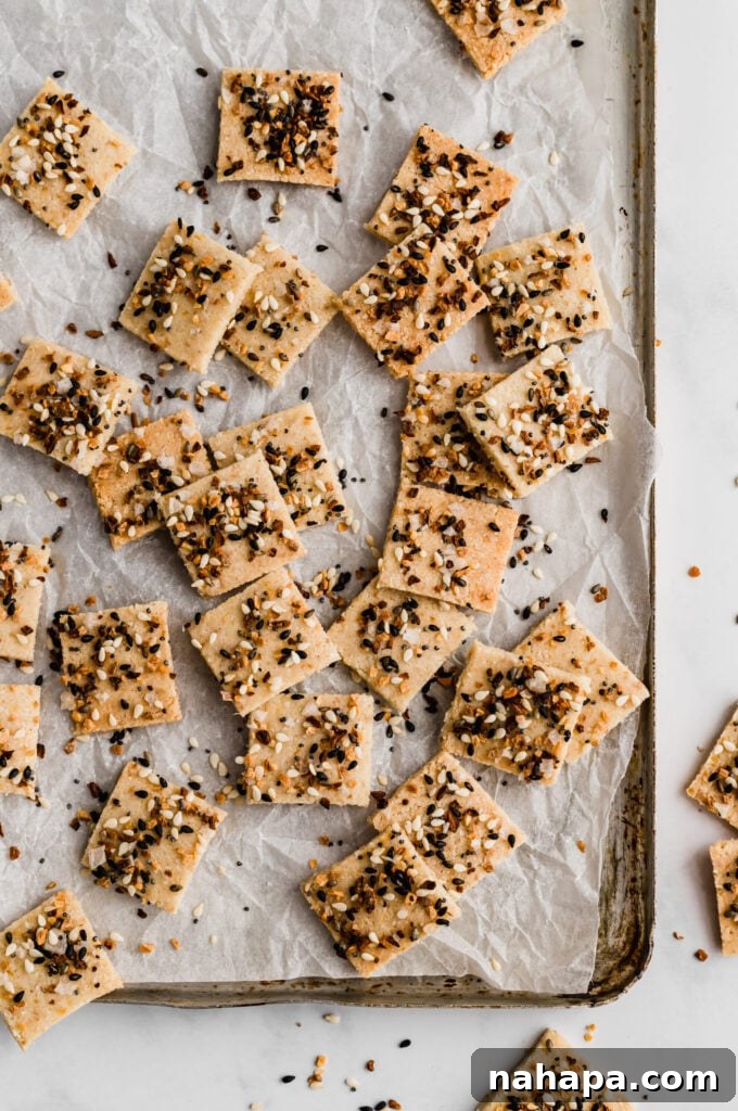 Close-up of baked paleo everything bagel crackers, perfectly golden and crispy