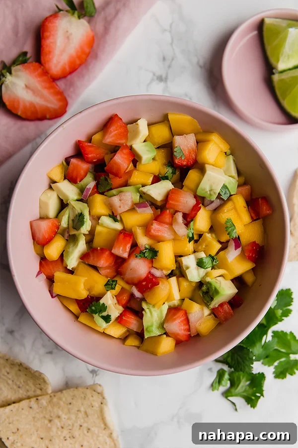 Fresh and vibrant strawberry mango salsa with tortilla chips