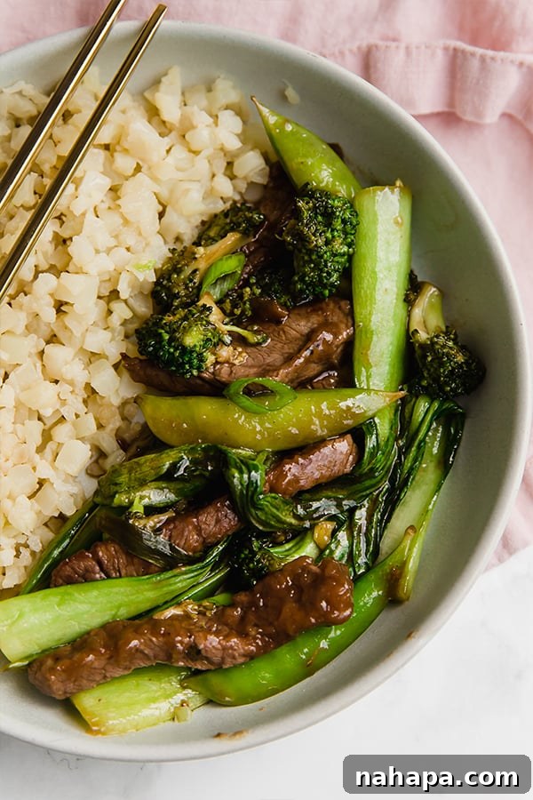 Stir fry in bowl with cauliflower rice