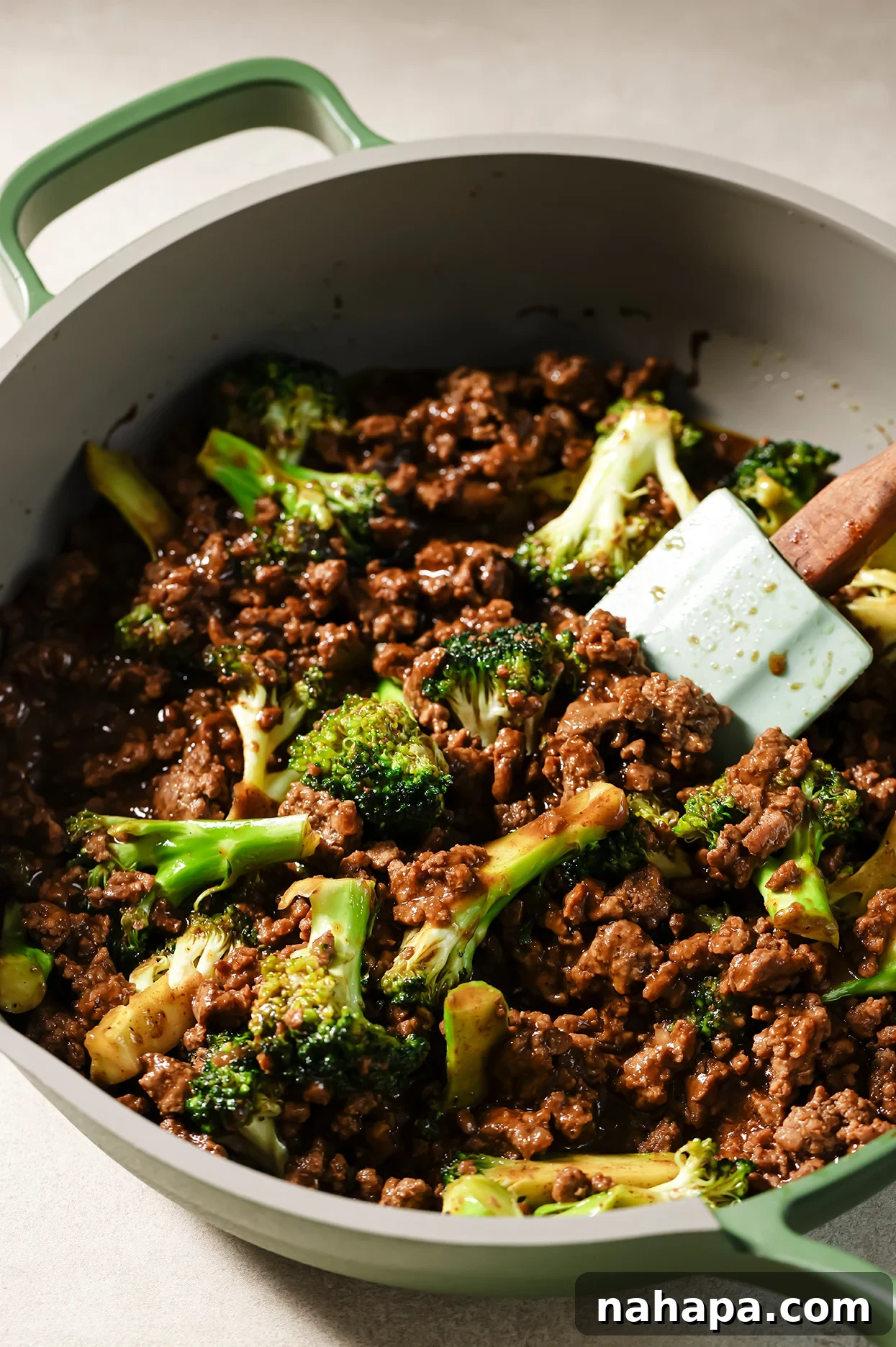 Hearty Ground Beef and Broccoli Skillet 8 Ground beef and broccoli in a large green pan, showing the complete dish.