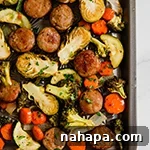 A small image of the One-Pan Sausage & Vegetables dish.
