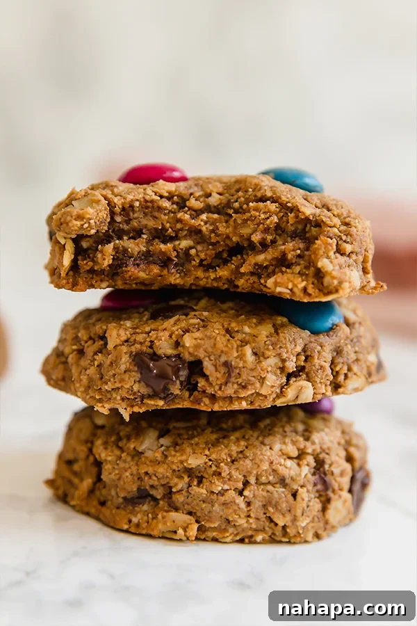 Three monster cookies stacked on top of eachother