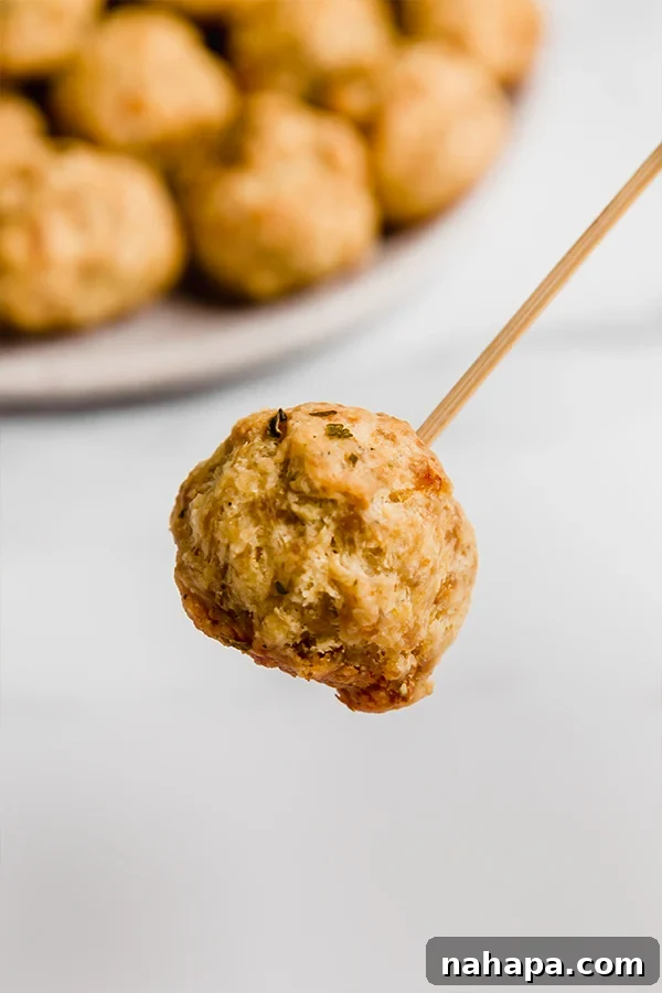 one sausage ball with a tooth pick