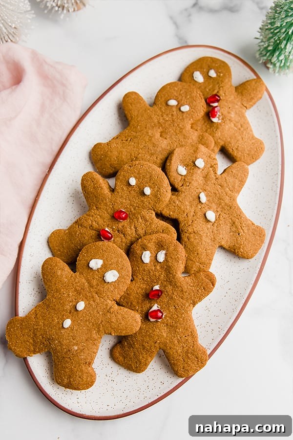 Gingerbread cookies arranged on an oval plate, ready to be served for the holidays.