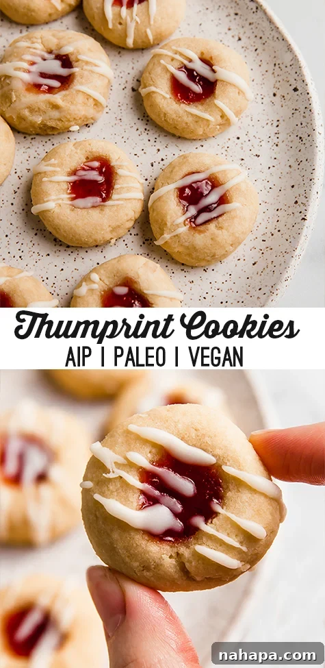 A beautifully arranged plate of gluten-free thumbprint cookies, featuring a variety of jam fillings and a delicate coconut butter drizzle, perfect for a holiday spread