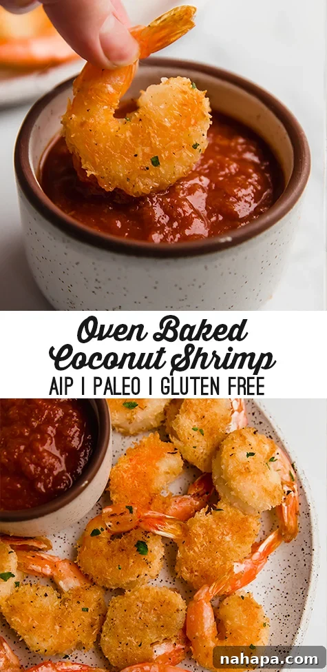 Pinterest-friendly vertical image of oven-baked coconut shrimp on a wooden board with limes and fresh herbs