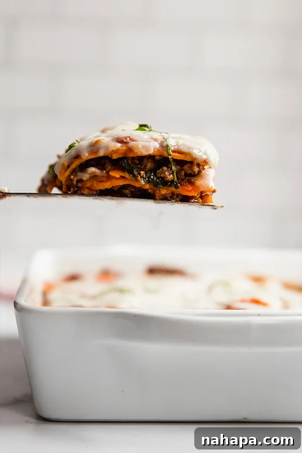 Sweet Potato Lasagna: An AIP, Paleo, and Dairy-Free Delight 3 sweet potato lasagna in casserole dish with one slice on spatula