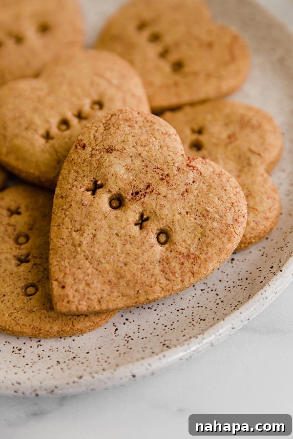 Conversation Heart Sugar Cookies displayed on a white plate