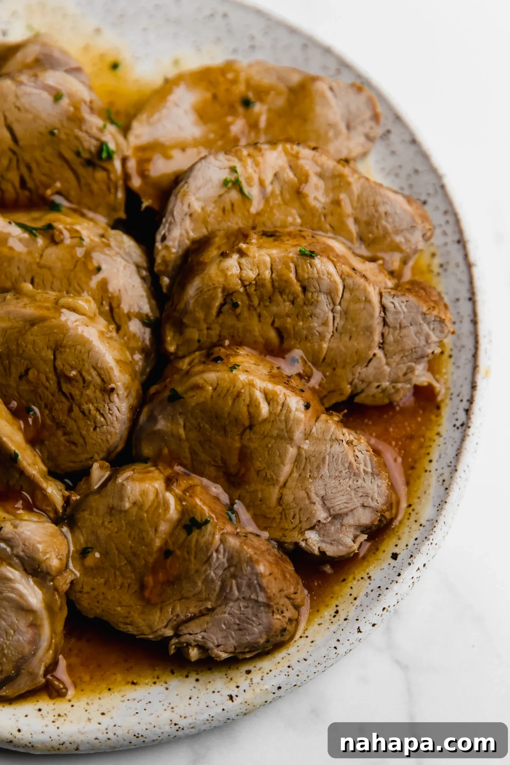 Sliced Instant Pot Pork Tenderloin with gravy