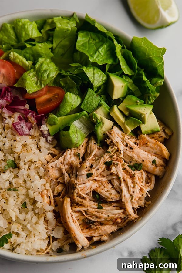 Burrito bowl served with toppings on counter – a healthy, vibrant meal for Paleo, Whole30, and AIP diets.