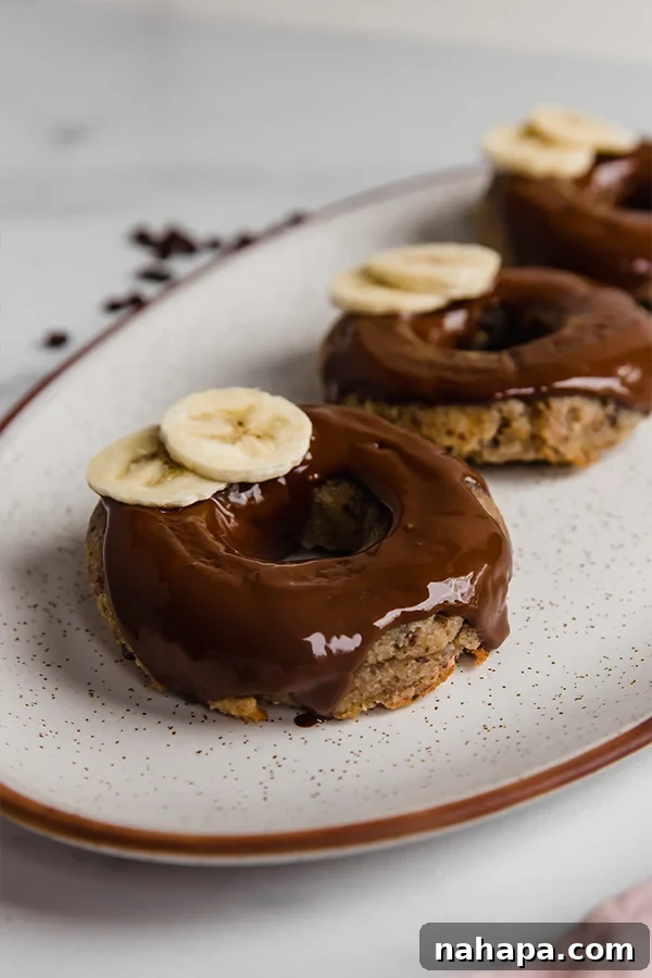 Delicious baked banana bread donuts, perfect for dessert or brunch.