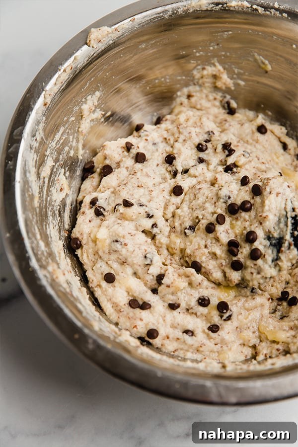 Banana bread donut batter ready for piping.