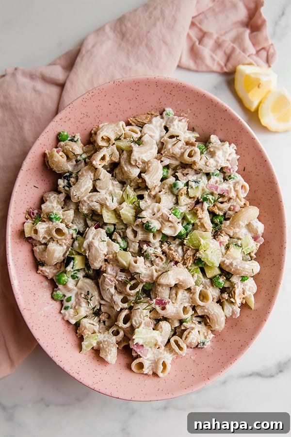 A beautifully presented gluten-free tuna pasta salad, showcasing the fresh, wholesome ingredients and its appeal as a light, healthy meal option.
