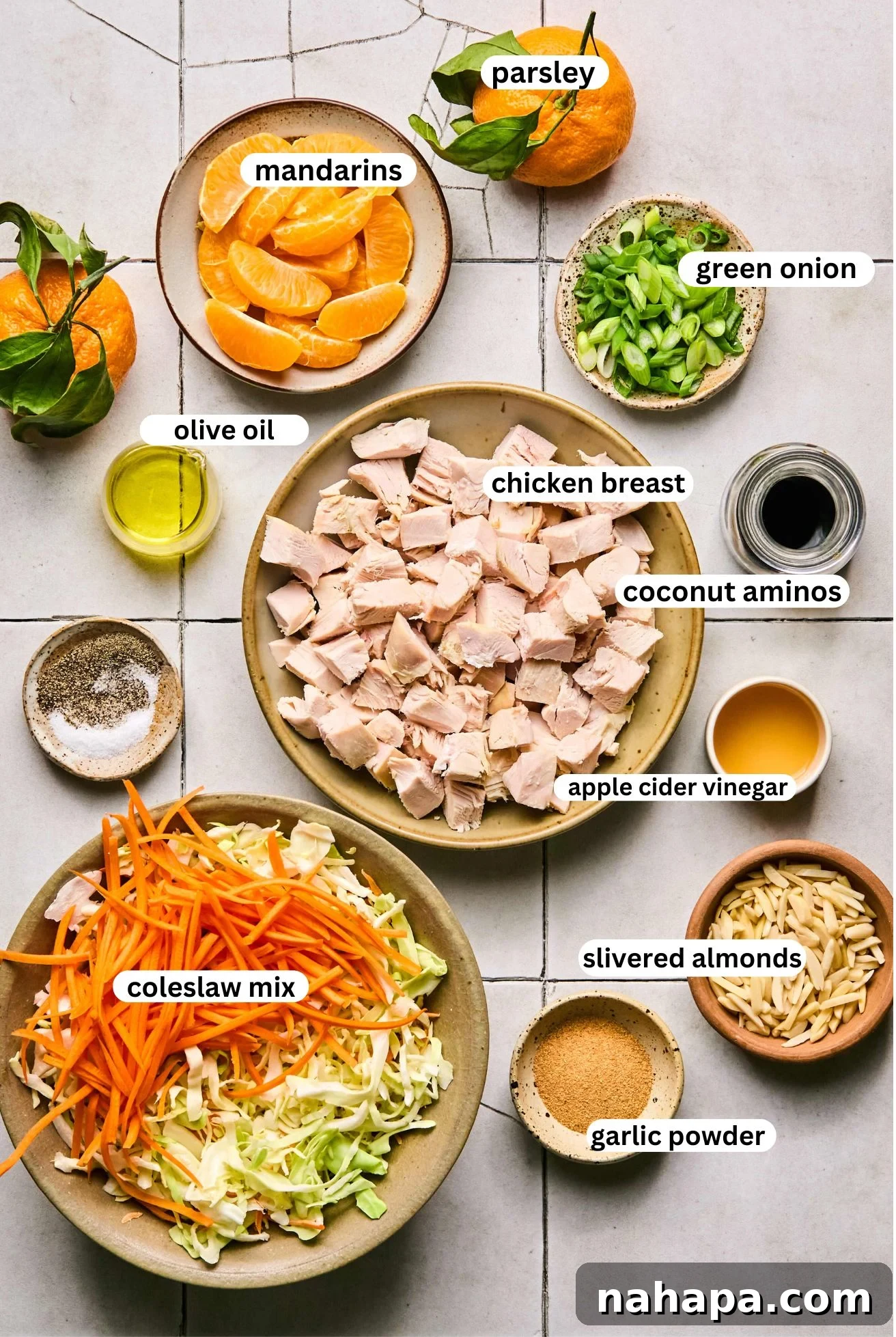 All the fresh ingredients for Gluten-Free Chinese Chicken Salad laid out in separate bowls