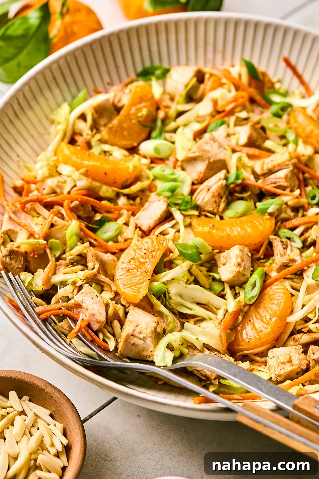 Close-up of the delicious Gluten-Free Chinese Chicken Salad in a bowl, showing the vibrant colors and textures