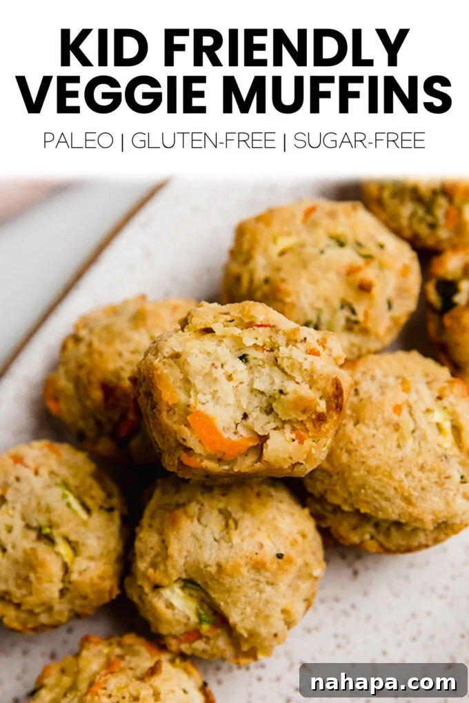 A close-up shot of a healthy gluten-free veggie muffin, showing its texture and ingredients.