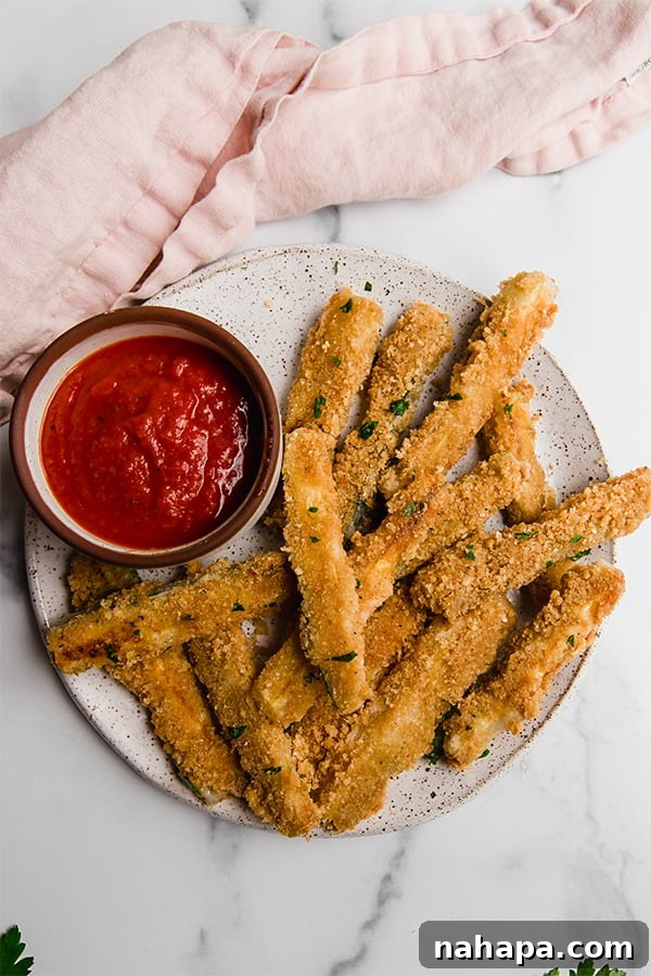 Zucchini fries with pork panko and marinara sauce for dipping