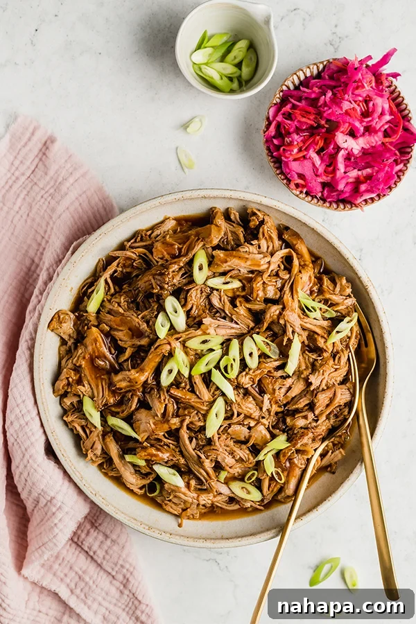 Flavorful Slow Cooker BBQ Pulled Pork, ready to be enjoyed, served in a bowl.