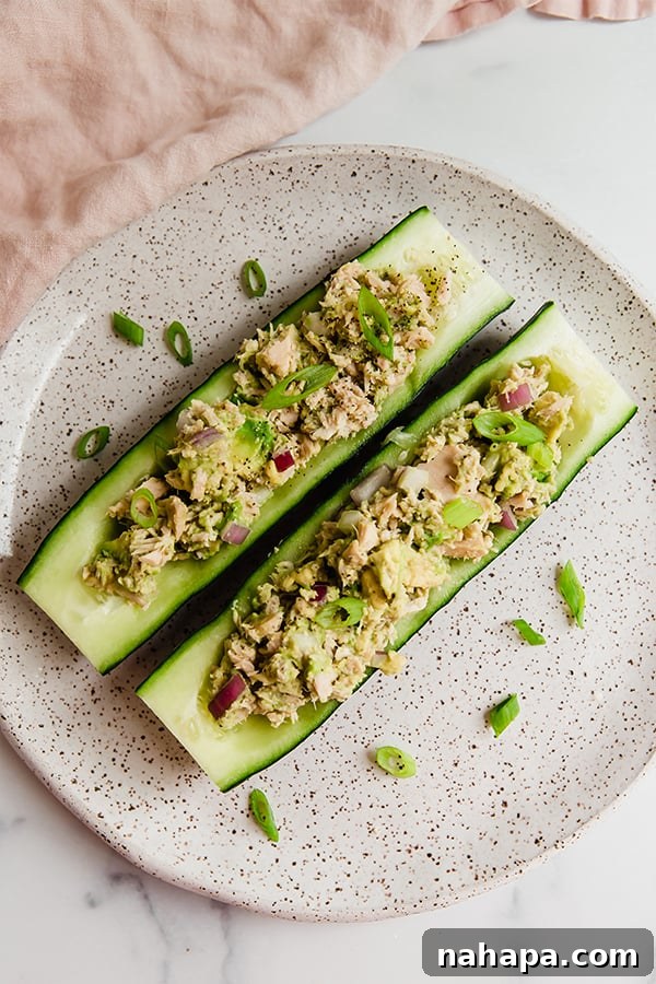 Delicious Cucumber Avocado Tuna Salad Boats, ready to eat.
