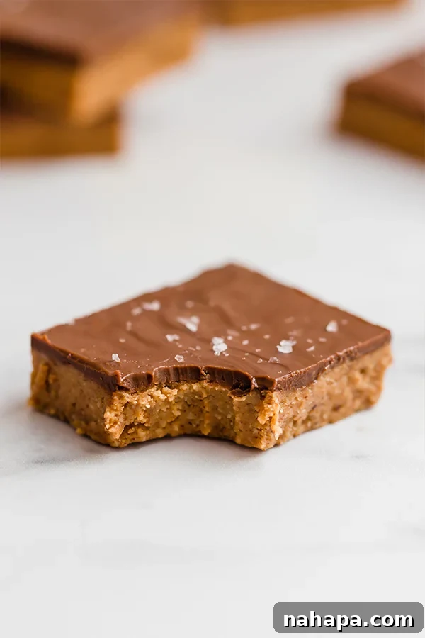 Almond butter bar with bite in the corner