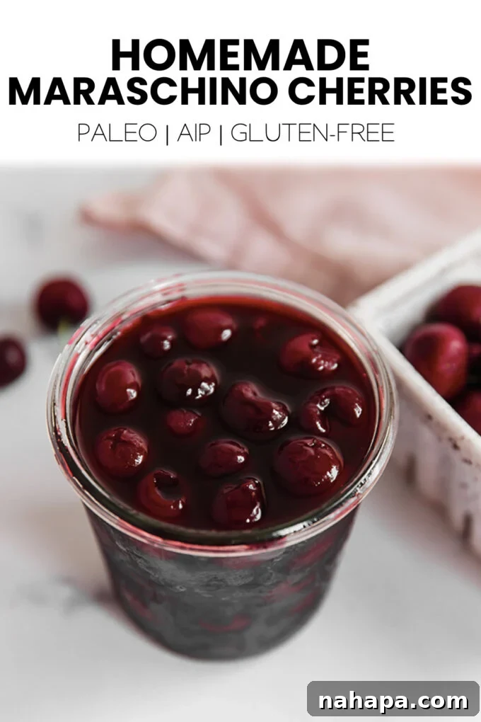 A Pinterest-ready image of homemade maraschino cherries, vibrant and appealing in a jar.
