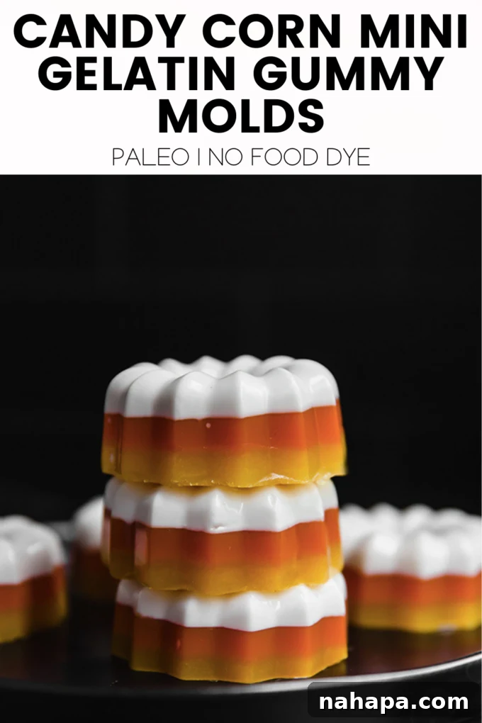 A large image of the finished candy corn gelatin molds on a patterned background, emphasizing their natural beauty.