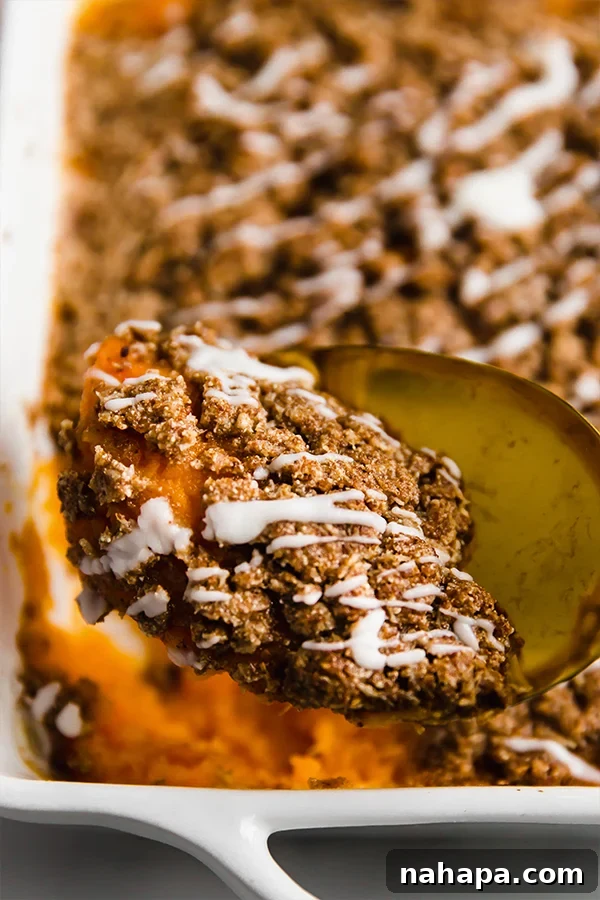 A spoonful of sweet potato casserole.