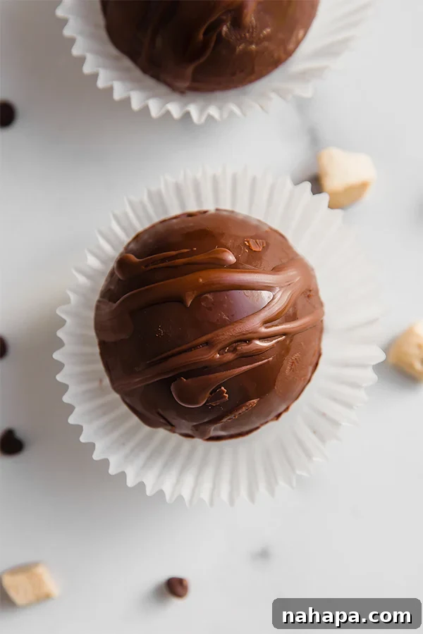 Assorted dairy-free hot cocoa bombs, beautifully decorated and ready for gifting
