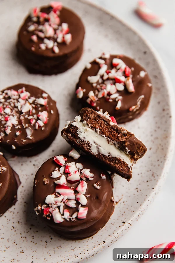 A beautifully arranged stack of finished Peppermint Joe Joe's, ready to be enjoyed as a festive treat.