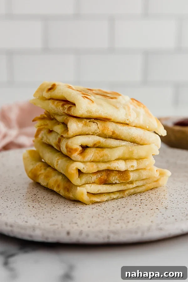 Paleo AIP Sweet Potato Lefse: A Healthy Norwegian Delight 2 A stack of golden brown sweet potato Norwegian Lefse, perfectly thin and round, ready to be enjoyed.