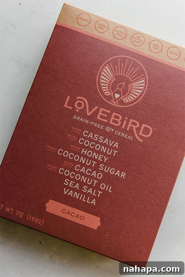 A box of Lovebird Cacao Cereal displayed prominently, highlighting its role as a key ingredient for healthy, allergen-friendly snacks.